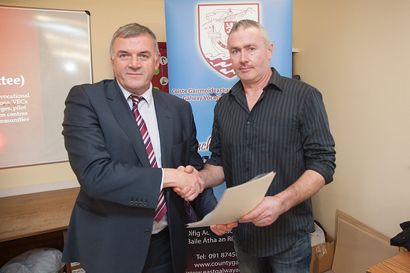 BIM_Certs-0133: 12/12/12: Údarás na Gaeltachta CEO Steve Ó Cúláin presenting a certificate to Micheál Ó Fatharta, Rosamhíl. Pic: Seán Ó Mainnín