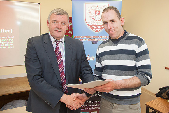 BIM_Certs-0142: 12/12/12: Údarás na Gaeltachta CEO Steve Ó Cúláin presenting a certificate to Michael Conroy, Leitirmóir. Pic: Seán Ó Mainnín