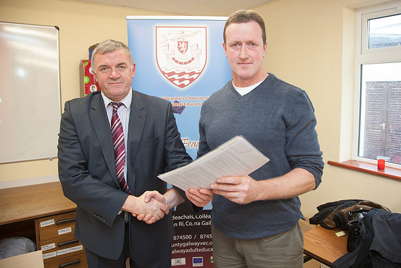 BIM_Certs-0153: 12/12/12: Údarás na Gaeltachta CEO Steve Ó Cúláin presenting a certificate to Tommy Folan, Seanachmhea. Pic: Seán Ó Mainnín
